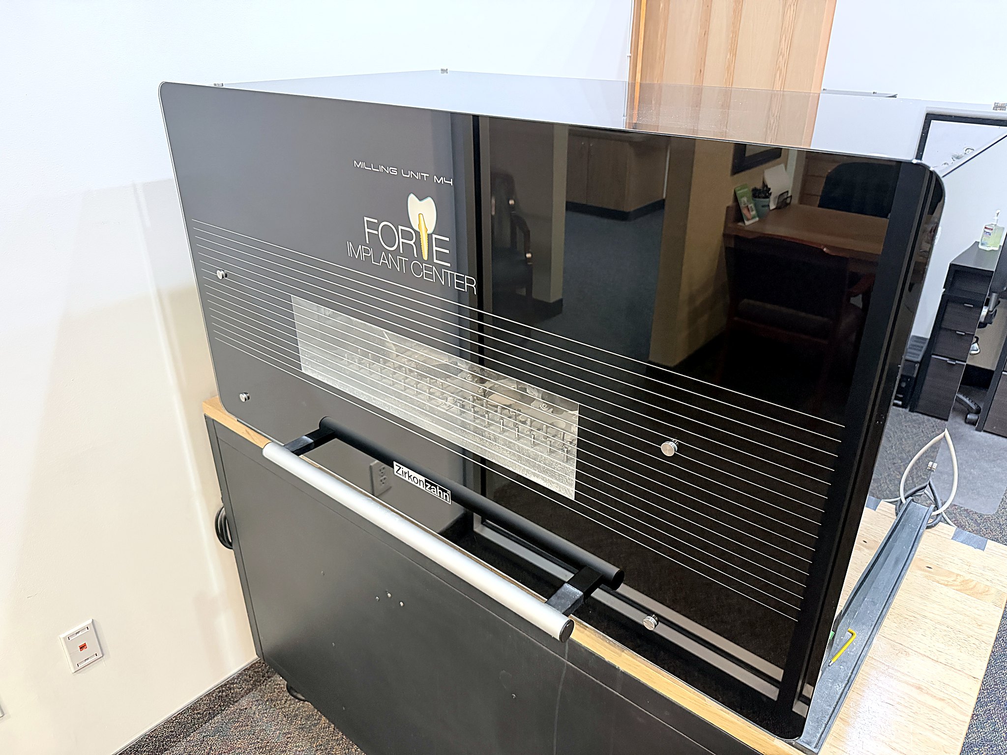 Forte-branded ZirkonZahn milling unit in Forte Implant Center's in-house dental laboratory, Plano TX